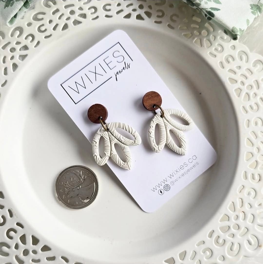 Hollow Leaf Drops (Stainles steel posts) by Wixies with white textured polymer clay and wooden tops Handmade and Picked in Nova Scotia