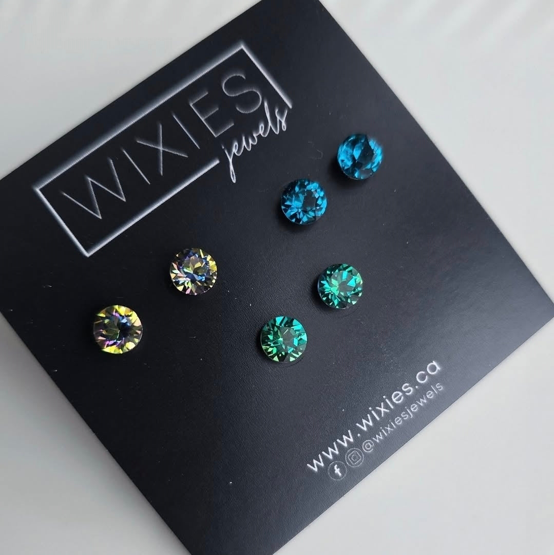 Wixies 3 Pack "Green Theme" 6mm Studs featuring three pairs of sparkling green and blue faceted stones on black card
