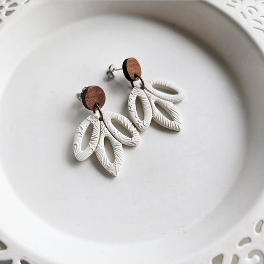 Hollow Leaf Drops (Stainles steel posts) by Wixies with textured white polymer clay and wooden accents Handmade and Picked in Nova Scotia