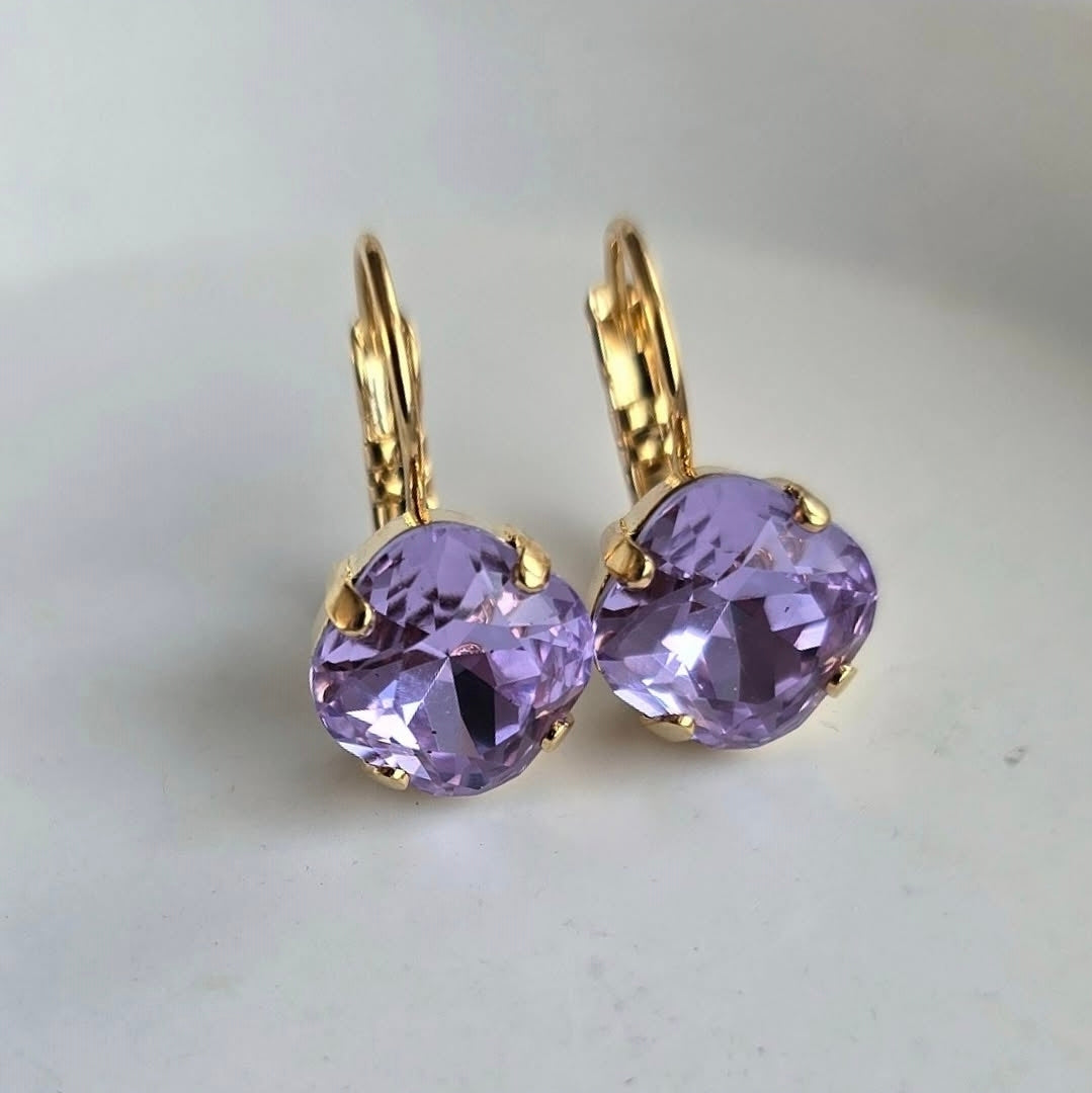 Lilac Cushion Lever Back earrings by Wixies featuring radiant purple stones in gold settings Handmade and Picked in Nova Scotia