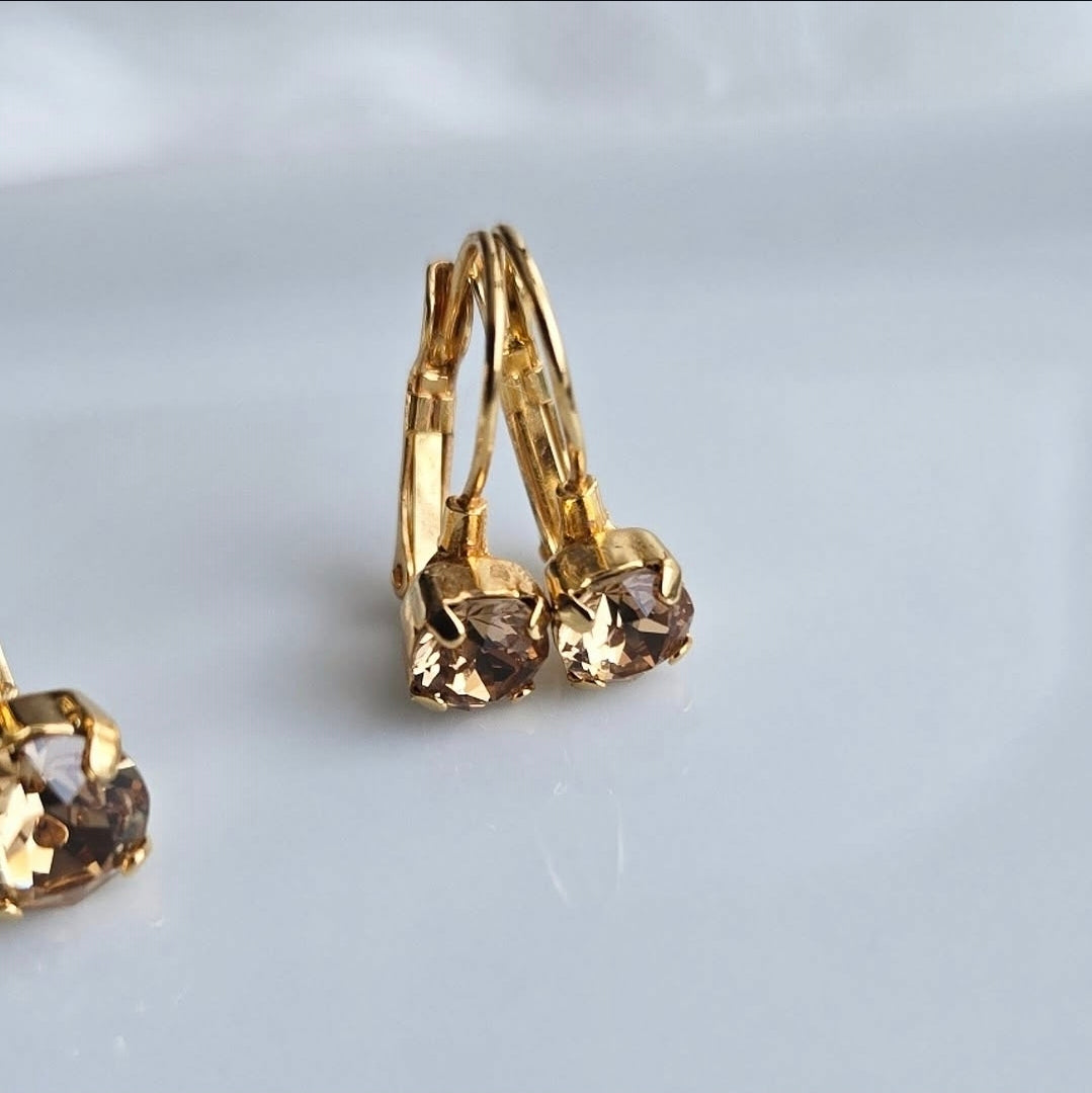 Wixies Light Topaz 8mm or 6mm Lever Back earrings with warm golden stones in gold plated brass settings on white background