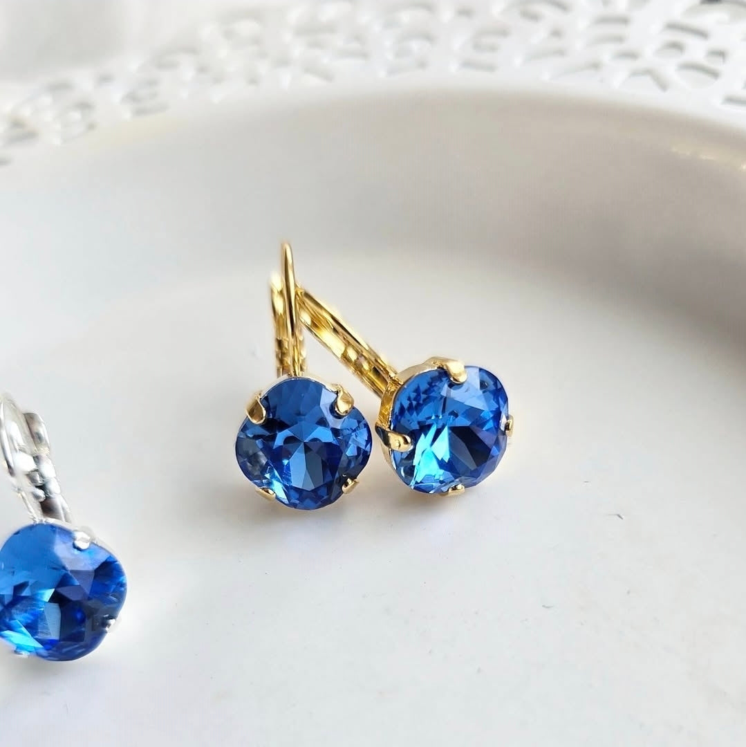Sapphire"Cushion Lever Back earrings by Wixies featuring vibrant blue stones in gold settings Handmade and Picked in Nova Scotia