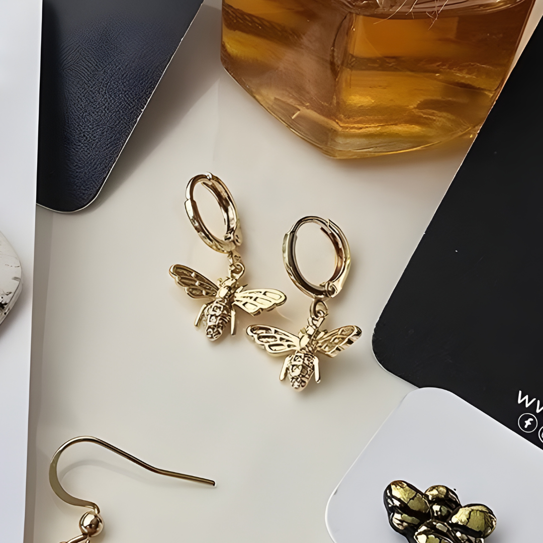 Bee Huggie Hoops (Necklace Option Available) with gold bee charms featuring cubic zirconia, elegant design by Wixies