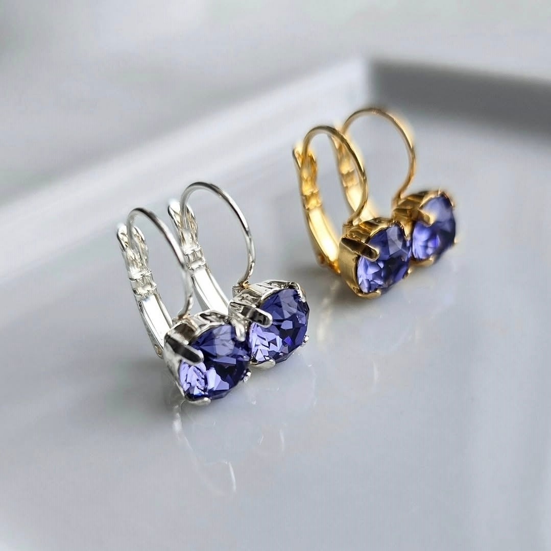 8mm or 6mm Indigo Violet Lever Back by wixies displaying violet stones set in silver and gold lever back earrings on white surface