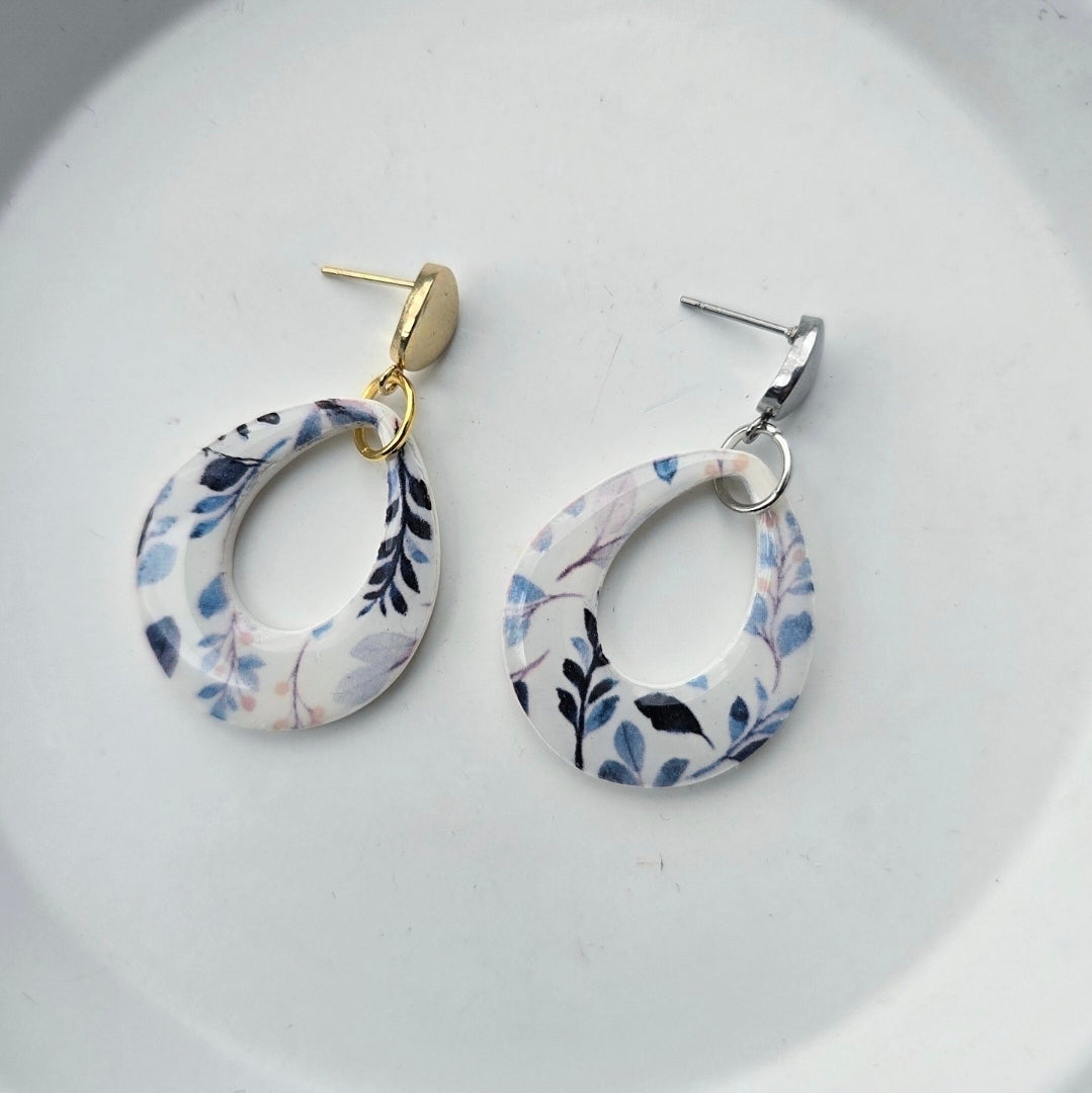 Big Blue Drops by Wixies featuring blue and black floral resin open oval earrings Handmade and Picked in Nova Scotia