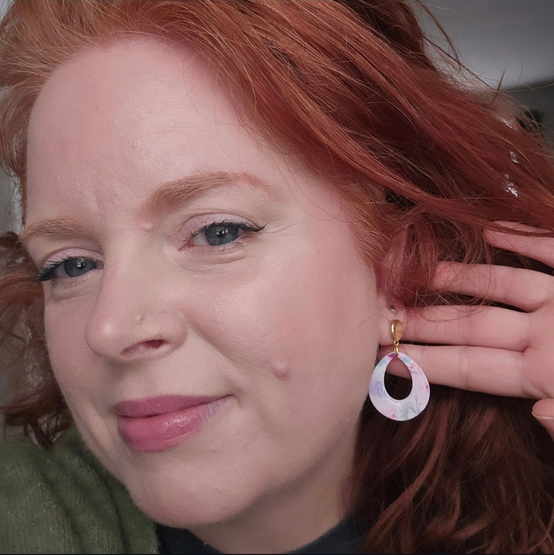 Big Blue Drops by Wixies featuring hand-painted blue resin open oval earrings Handmade and Picked in Nova Scotia